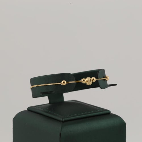 طقم ذهب بتصميم كرات ليزر مميزة - عيار 21