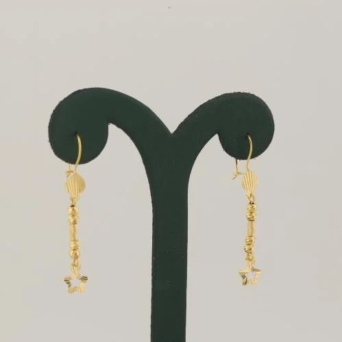 Gold hoop earrings with laser balls and star penda...