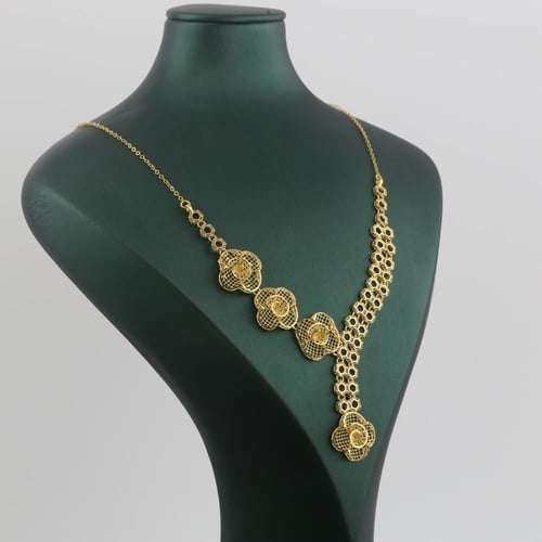 طقم ذهب بتصميم وردة مزخرفة - عيار 21