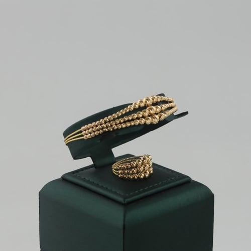 اسوارة وخاتم ذهب ادوار كرات الليزر - عيار 21