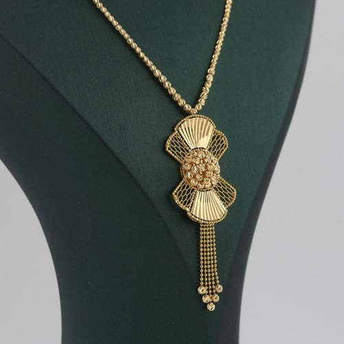 طقم ذهب بتصميم مميز بكرات اليزر - عيار 21