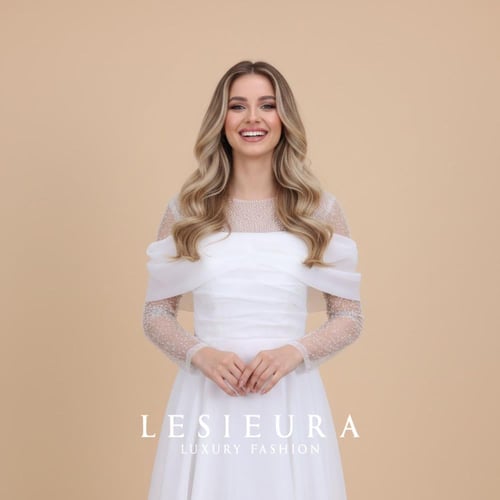 فستان سهرة ابيض طويل أنيق بأكمام لولو