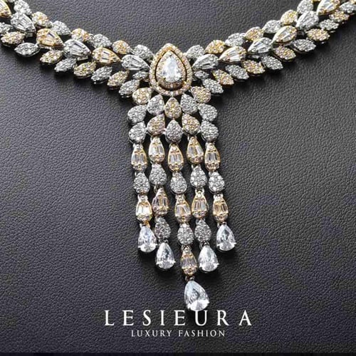 طقم اكسسوار نوميارا الفاخر بلونين ذهبي وفضي