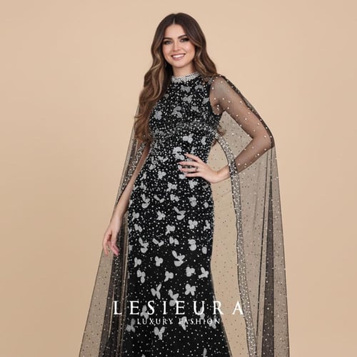 فستان سهرة اسود بتطريز فاخر لكامل الفستان