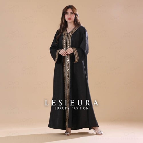 جلابيه باللونين الاسود والذهبي