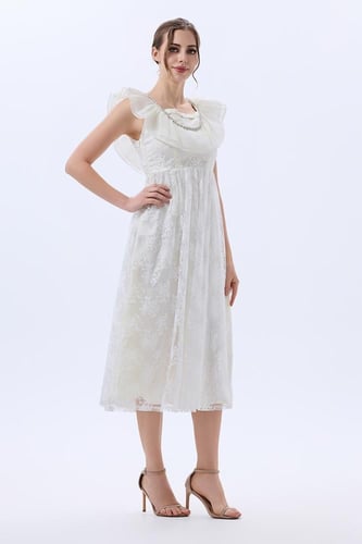 فستان تول مطرز مع ياقة كشكش