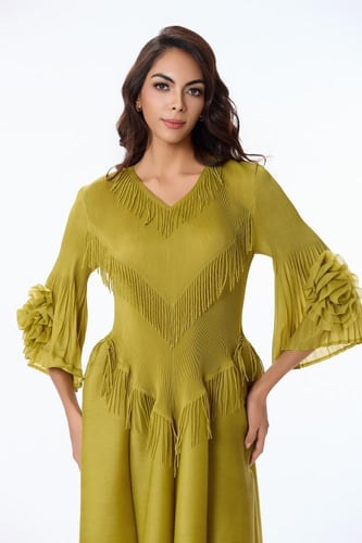 فستان بليسيه اخضر مع هدب