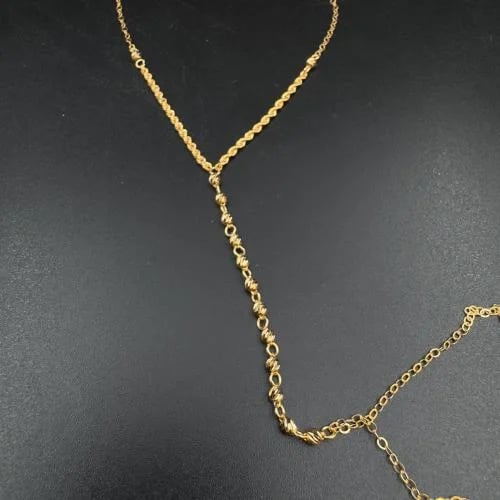 Gold hand with Durica design