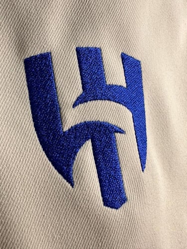 شنطة ظهر بشعار الهلال بيج