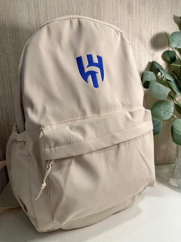شنطة ظهر بشعار الهلال بيج