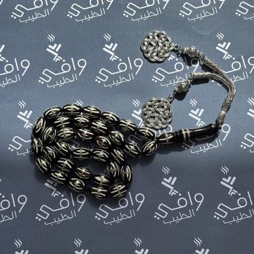 مسباح كوك مطعم بمعدن فضي