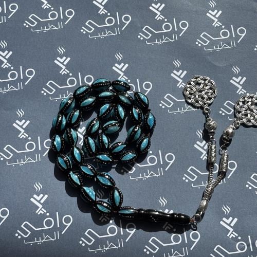 مسباح كوك مطعم بمعدن فضي