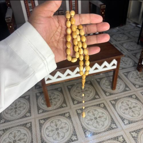 مسباح كوك أبيض طبيعي بيضاوي