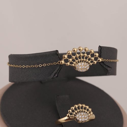 طقم ذهب الصدفة ( عيار 18 )