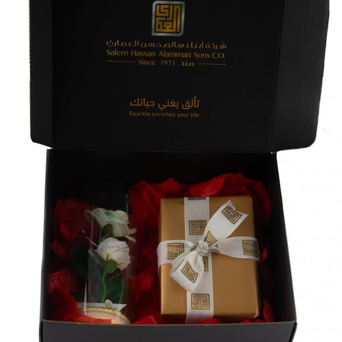 تغليف هدايا ذهب مع وردة دائمة