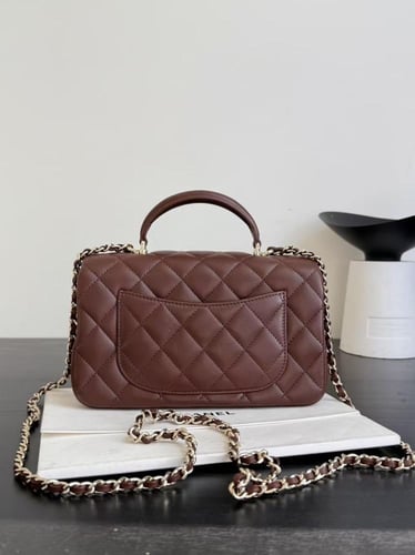 Chanel Lambskin Quilted Mini Top Handle / حقيبة شا...