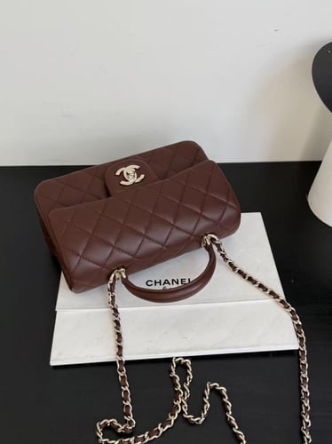 Chanel Lambskin Quilted Mini Top Handle / حقيبة شا...