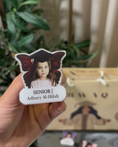 Graduation badge 2026 triangle butterfly wings pom...