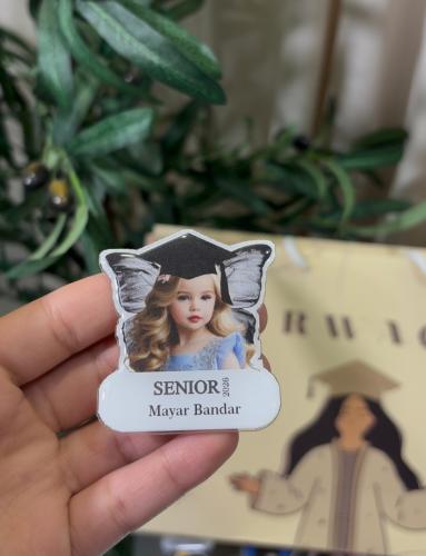 بروش تخرج 2026 مثلث اجنحة فراشة رمادي