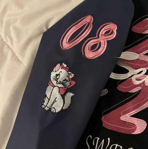 جاكيت اسود اكمام كحلي جلد