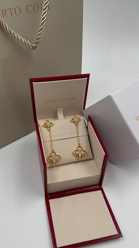 حلق روبيرتو كوين ذهبي