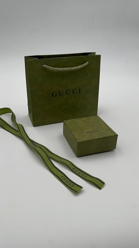 ملحقات قوتشي خضراء