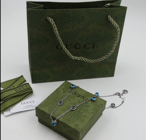 سلسال قوتشي فضي وازرق