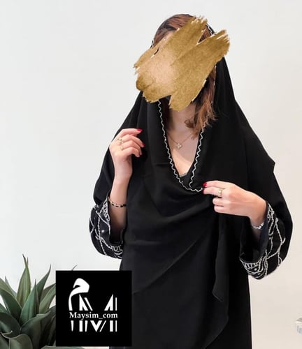 عبايه بقماش كريب اسود