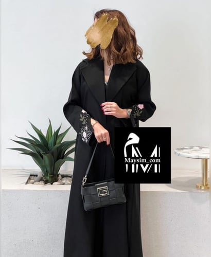 عبايه بقماش كتان مطرز