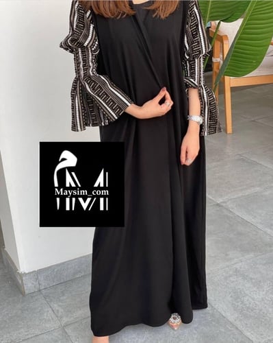 عبايه بقماش كريب اسود