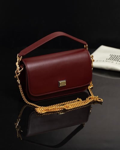 شنطة مستوحاة من D&G جلد طبيعي عنابي ماركة Elegance...