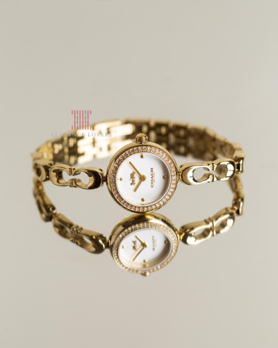 ساعة نسائية كريستال ماركة كوتش لون ذهبي - Dual C L...