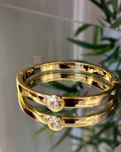 إسوارة كريستال مطلية ذهب ماركة كوتش