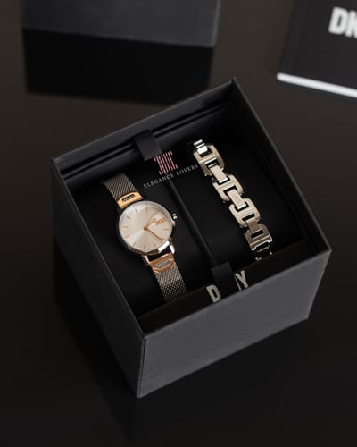 طقم نسائي ساعة + إسوارة ماركة دكني NY6684SET