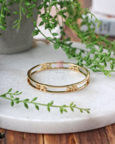 إسوارة مطلية ذهب ماركة كوتش