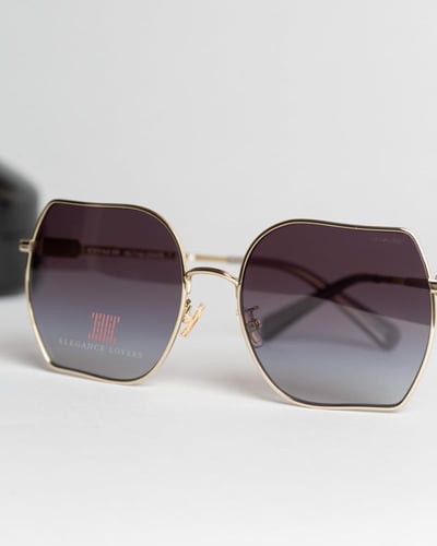 نظارة شمسية نسائية ماركة كوتش