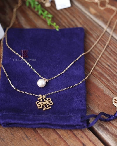 سلسال دبل لؤلؤ مطلي ذهب ماركة توري بورش