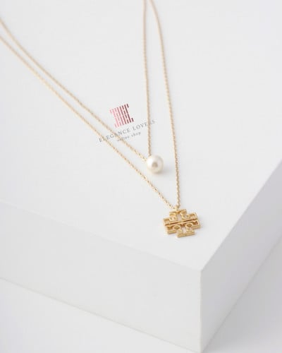 سلسال دبل لؤلؤ مطلي ذهب ماركة توري بورش