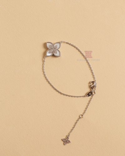 إسوارة وردة الأميرة صدف مطلية ذهب أبيض ماركة Elega...