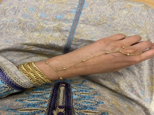 كف يد كوينز ذهبي