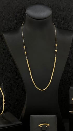 طقم ذهب صافي عيار 21 بالتصميم الراقي والناعم