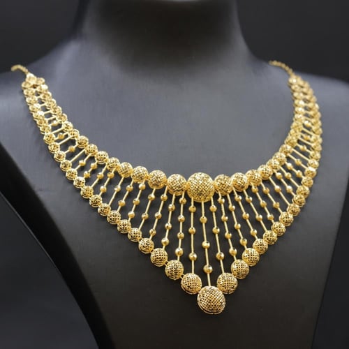 طقم ذهب صافي عيار 21 الكور الملكي