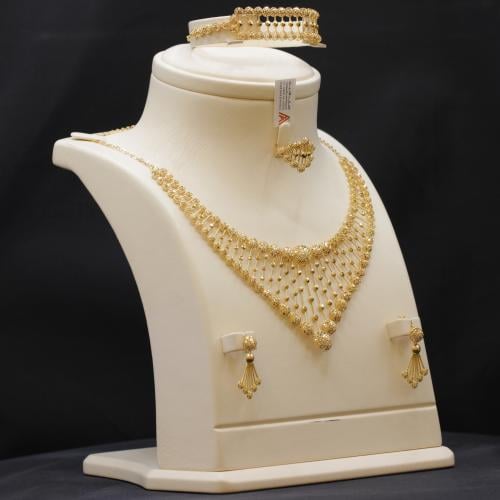 طقم ذهب صافي عيار 21 الكور الملكي