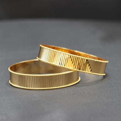 اساور ذهب صافي عيار 21 بتصميم دركتل روز الراقية وا...