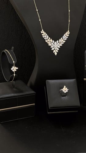 طقم ابيض بوزن 12.65