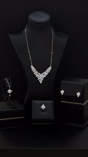 طقم ابيض بوزن 12.65