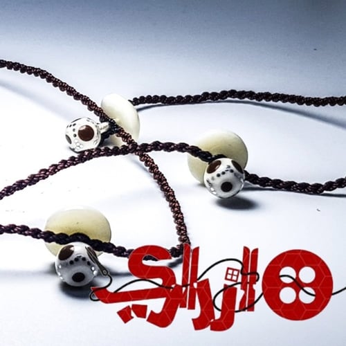 تركيبات عظم من ازراري لاناقة الثوب السعودي