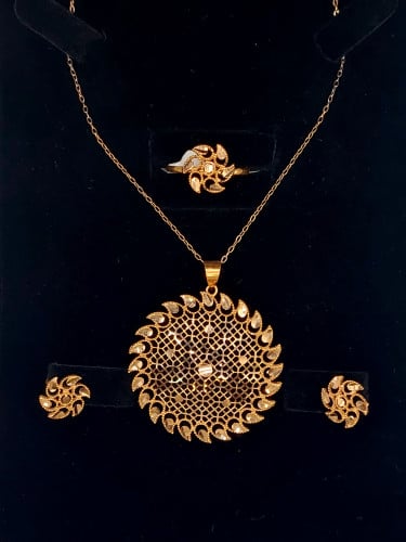 نص طقم-عيار 21