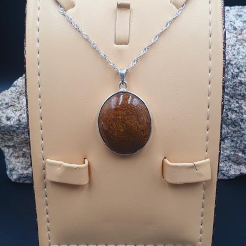 تعليقه عقيق يماني بني دائري برواز ساده