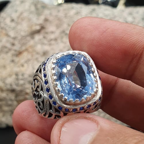 خاتم توباز لندني مطعم بالزركون الازرق منشار الشريف